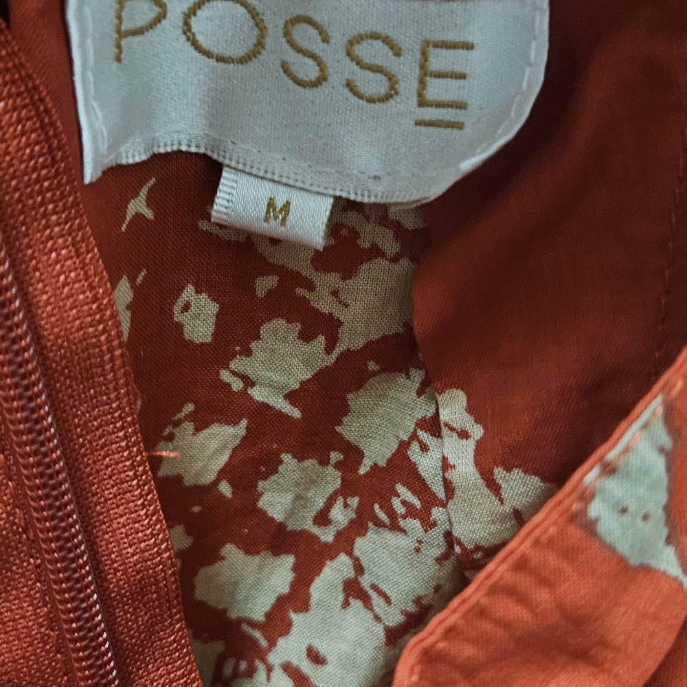 Posse jumpsuit cutout top with puff sleeves. Linen